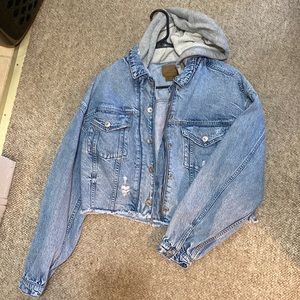 Size large, brand new jean jacket with hood